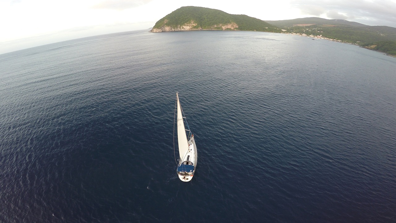 sailboat mountain sea free photo