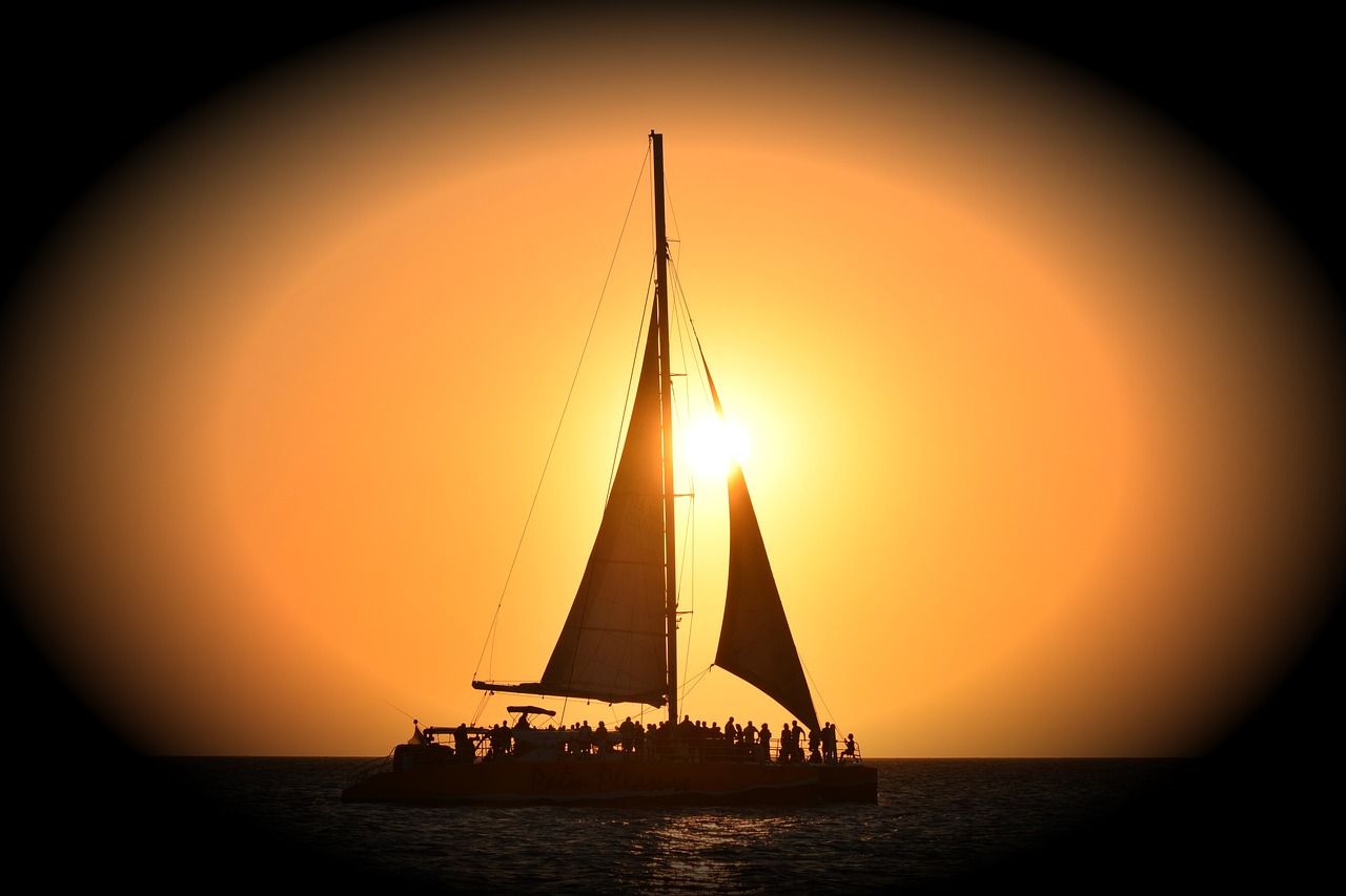 sailboat  sunset  sea free photo