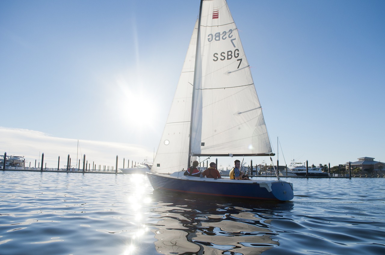 sailboat sun reflection free photo