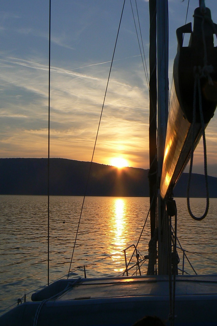 sailing boat water sunset free photo