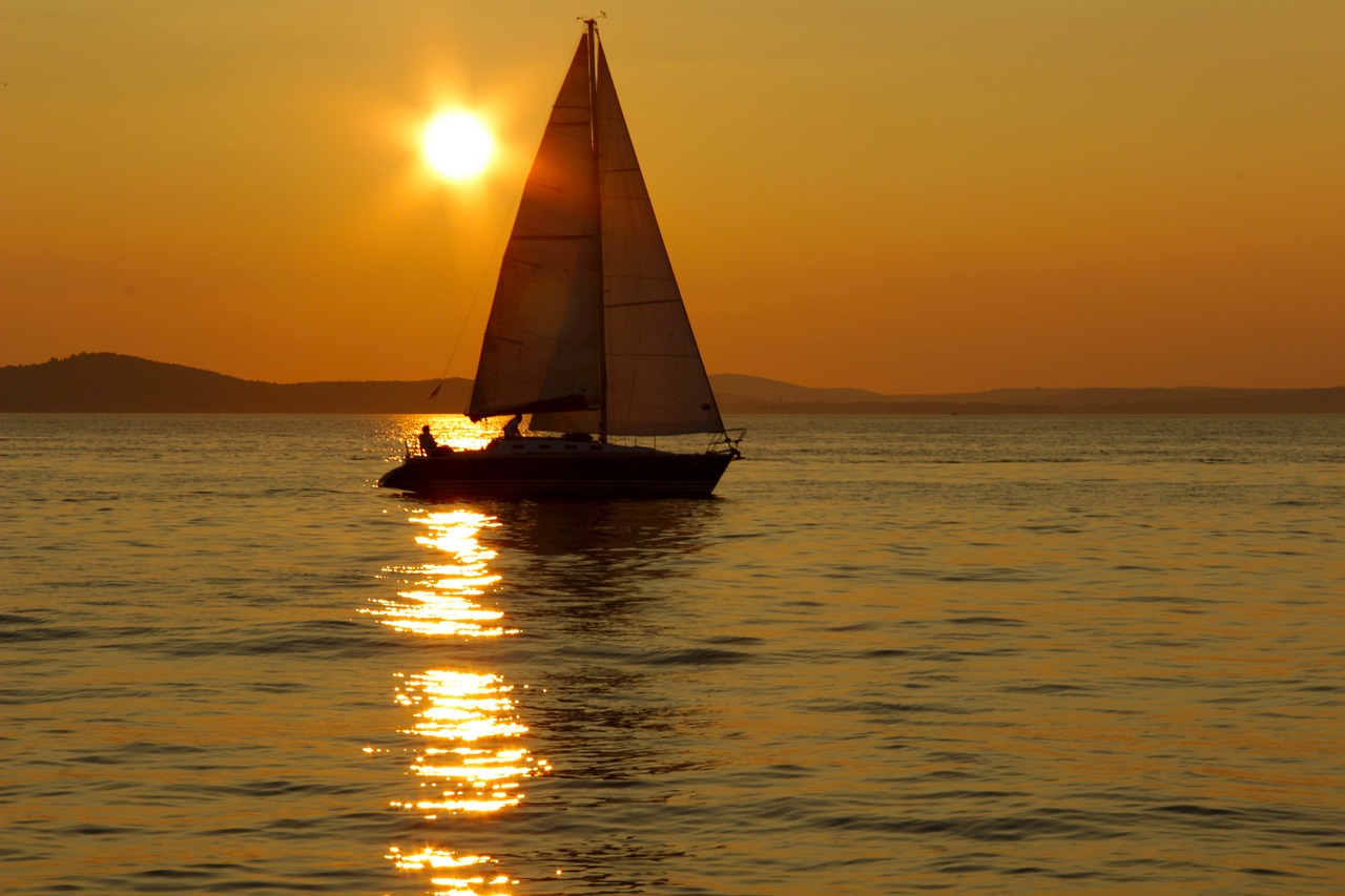 sailing boat sunset sea free photo