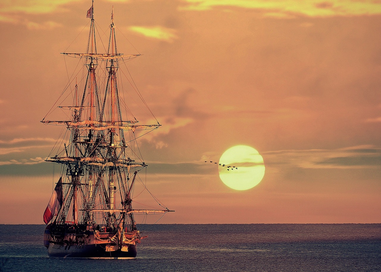 sailing vessel  sunrise  sunset free photo