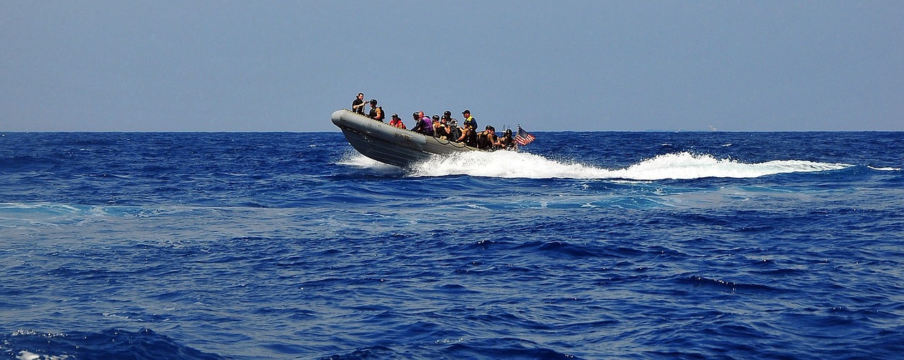 sailors rigid hull inflatable boat free photo