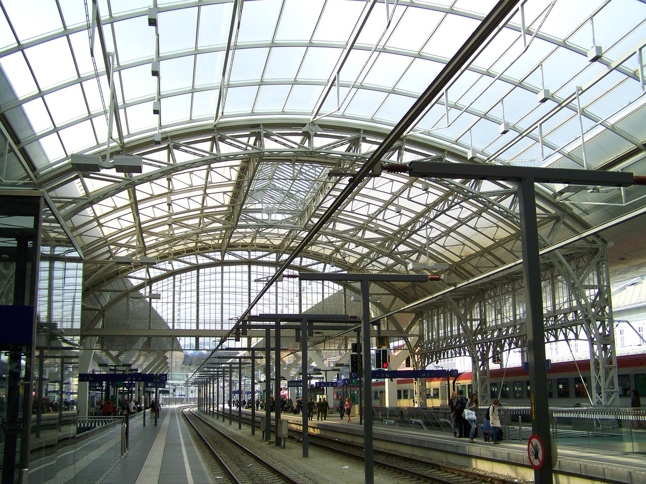 salzburg hauptbahnhof metal roofing rails free photo