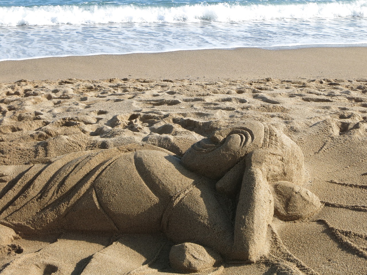 sand beach sculpture free photo