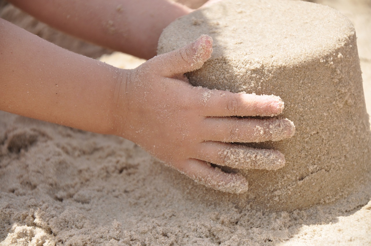 sand hand beach free photo