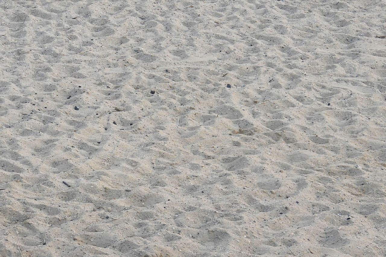 sand sand beach pebble free photo