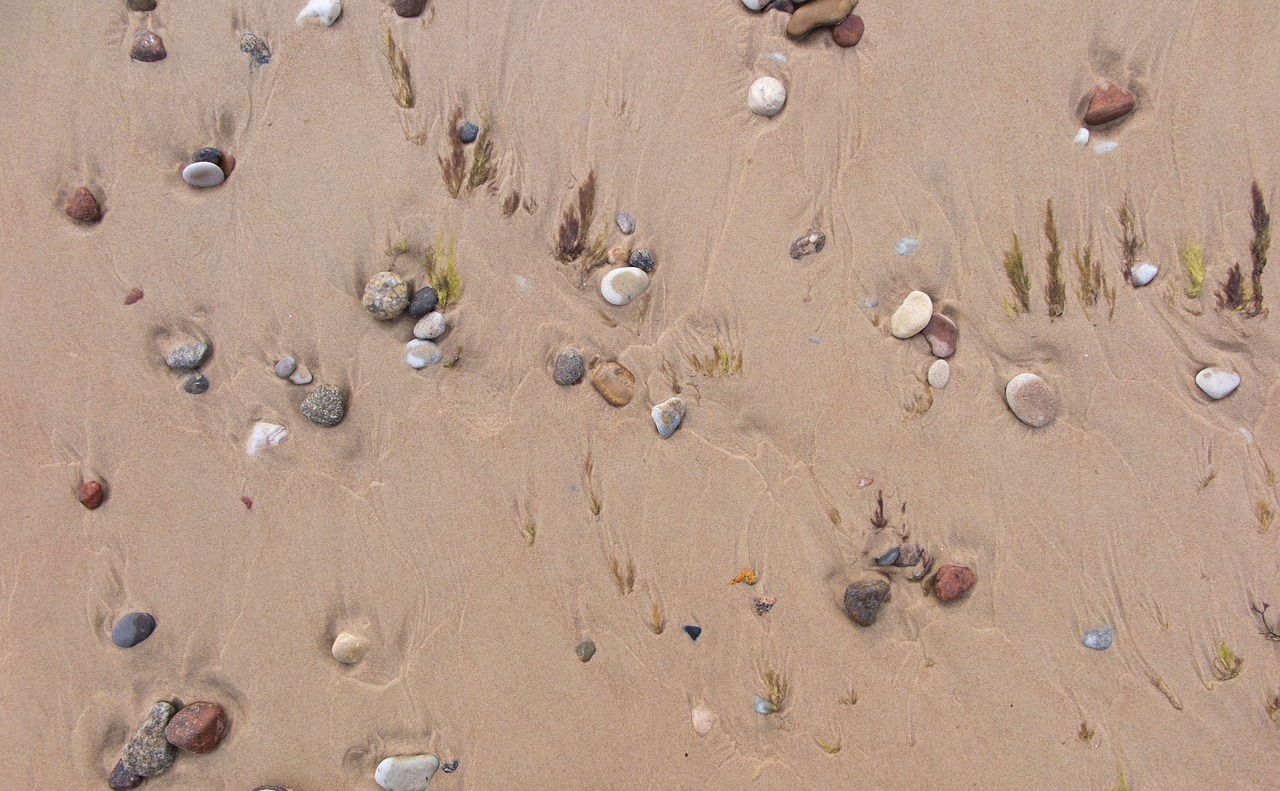 sand stones beach free photo