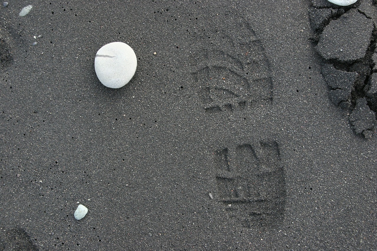 sand footprint stone free photo