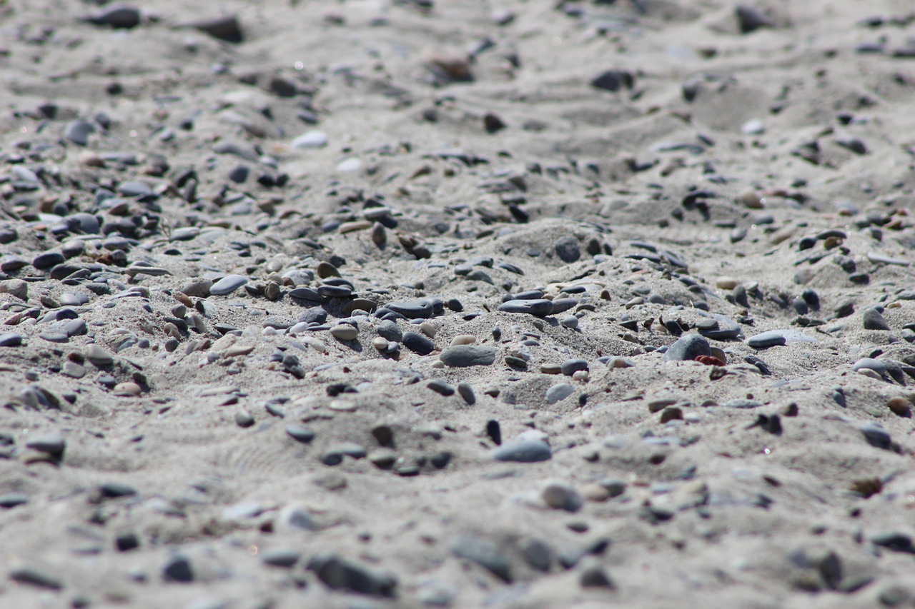 sand stones beach free photo