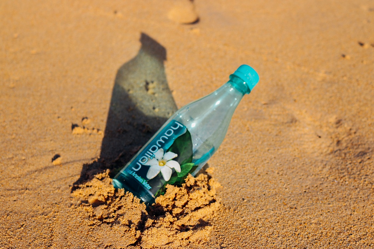 sand beach bottle water free photo