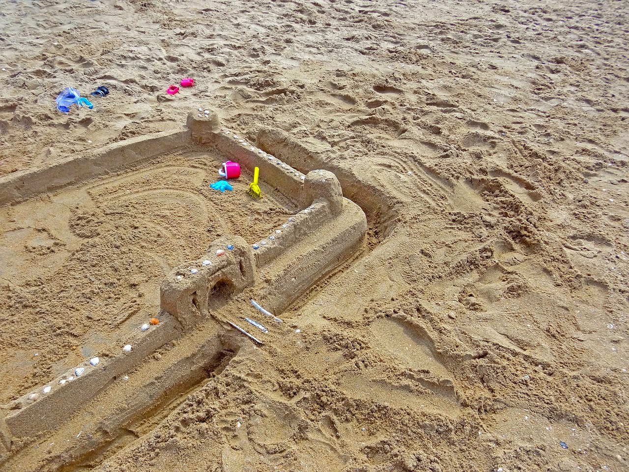 sand beach sandburg sand toys free photo