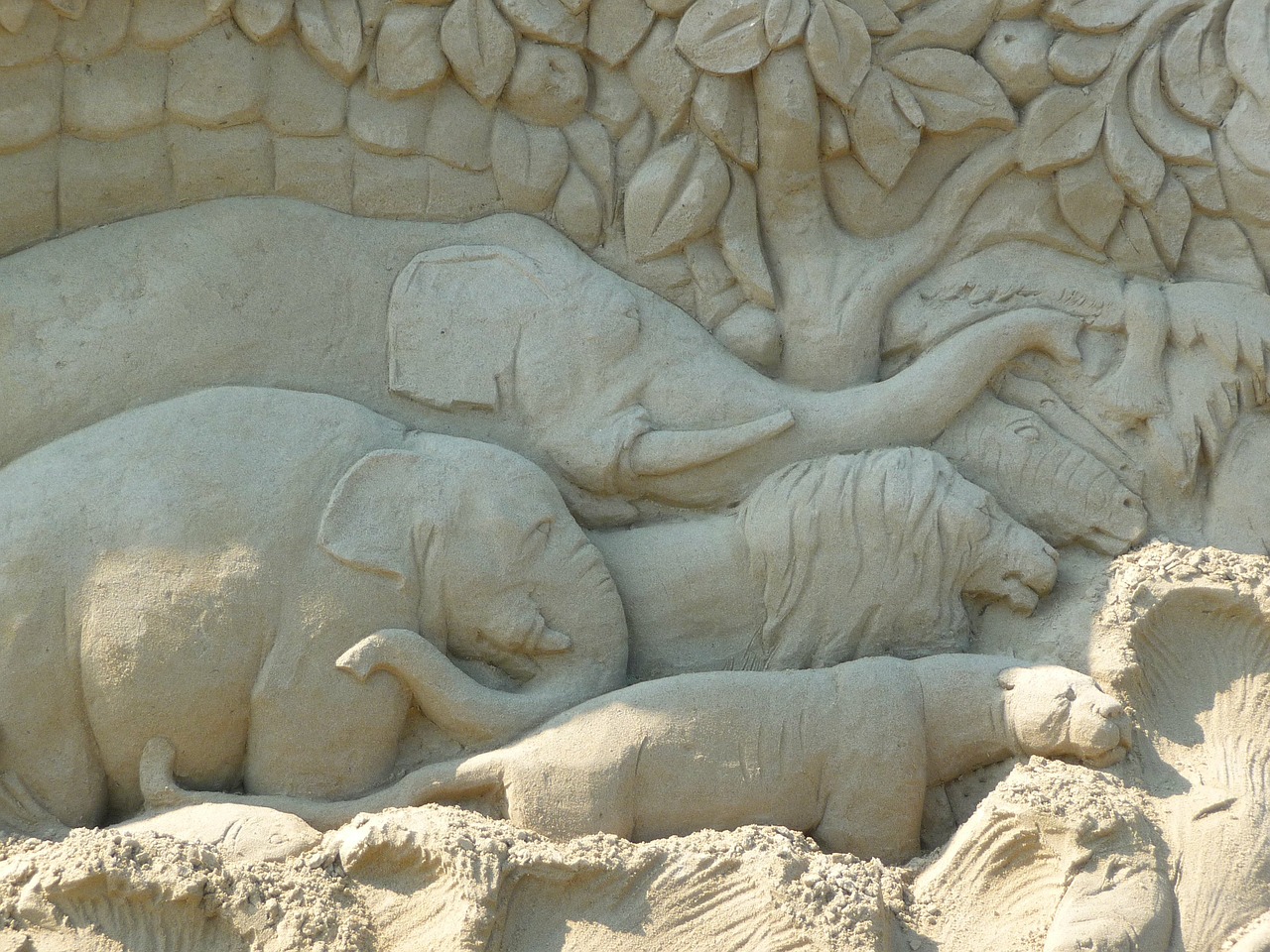 sand sculpture elephant face free photo