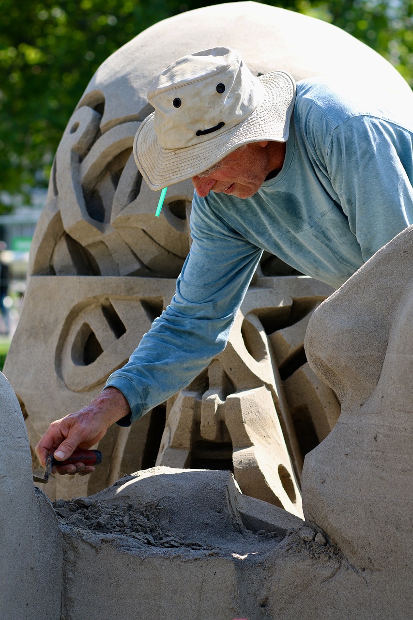 sand sculptures artists working free photo