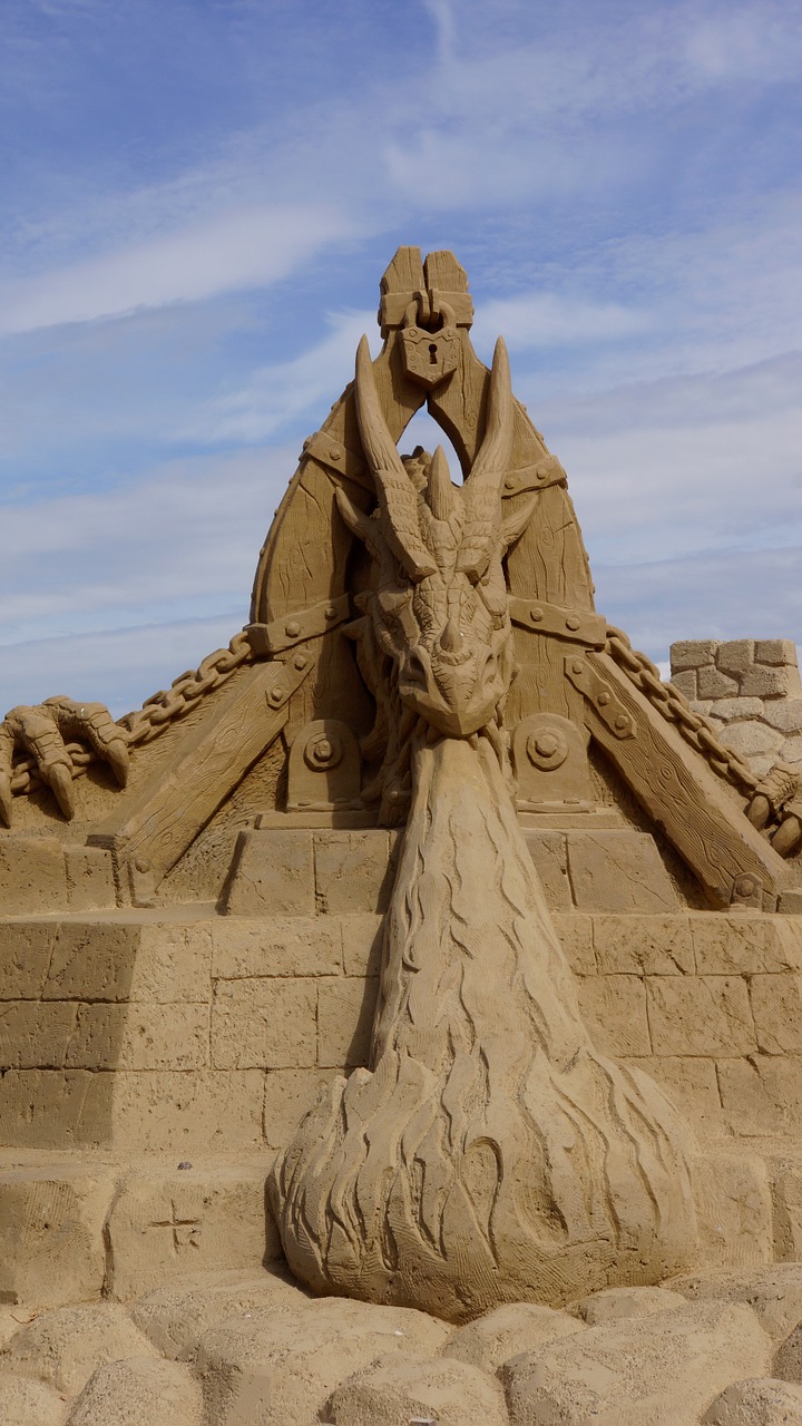 sandcastle sand sculpture dragon free photo