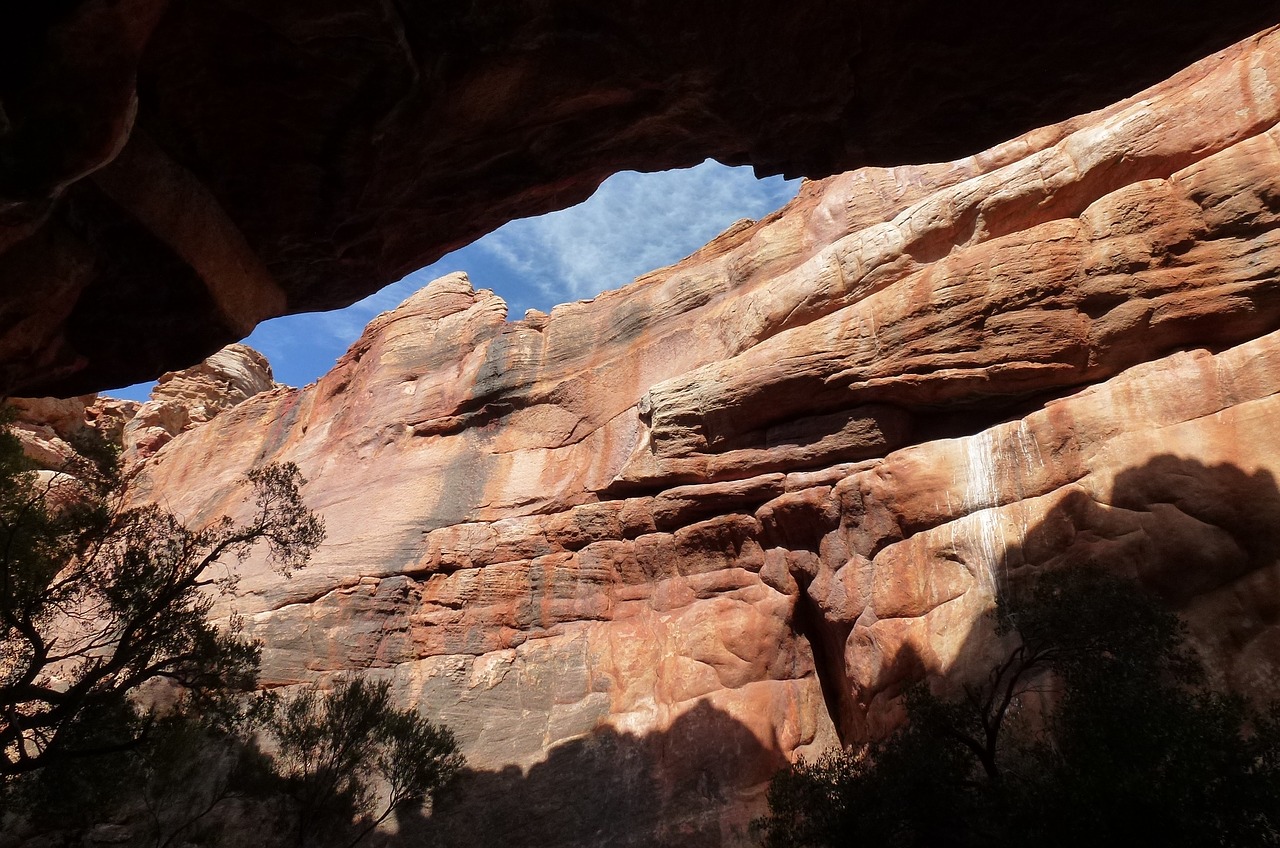 sandstone cave mouth rock formations free photo