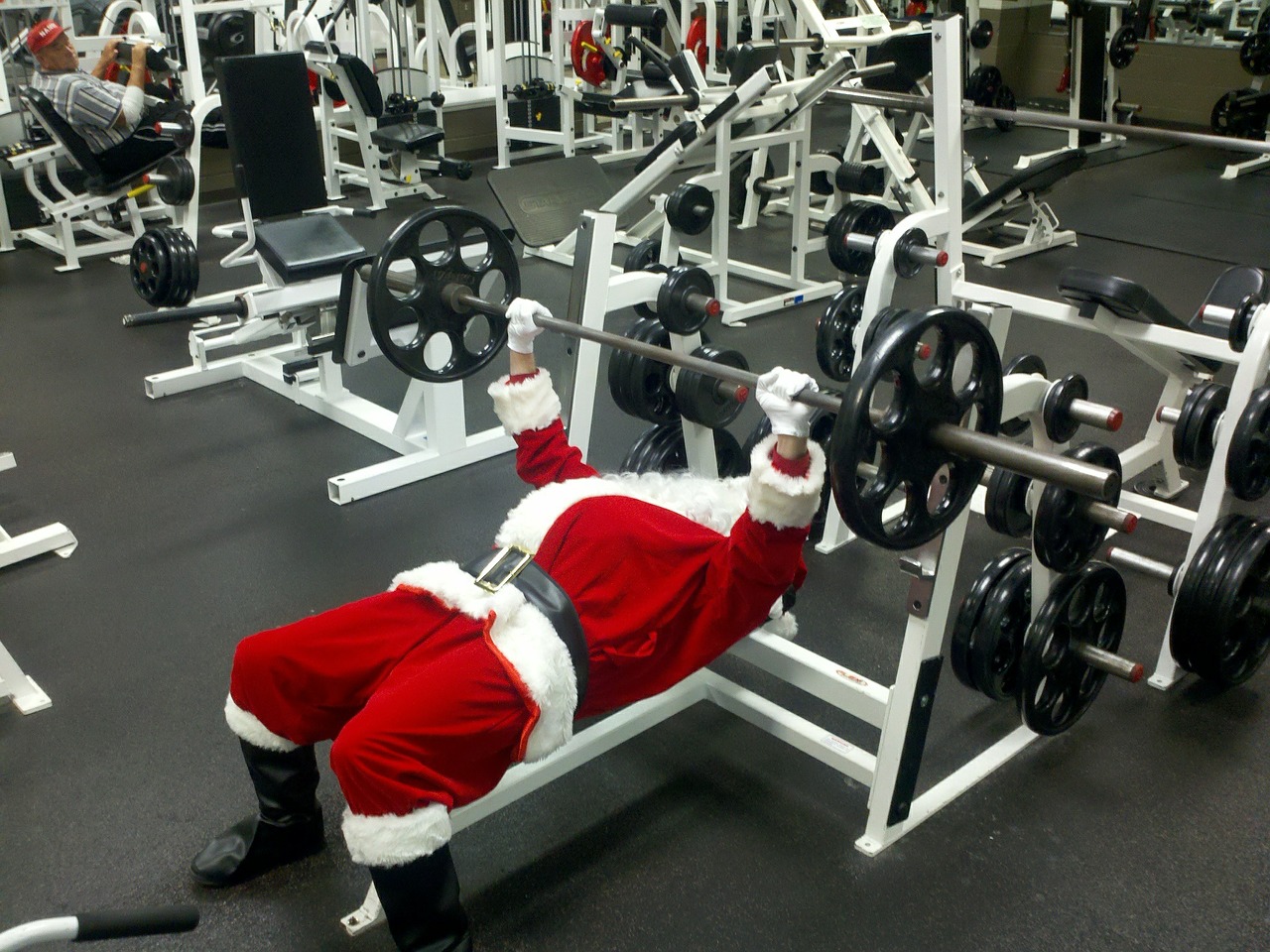 santa claus weight lifting exercise free photo