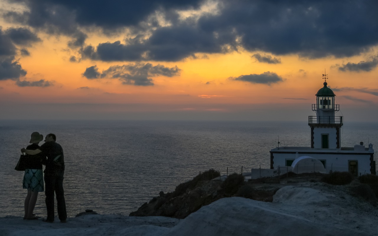 santorini lighthouse sunset free photo