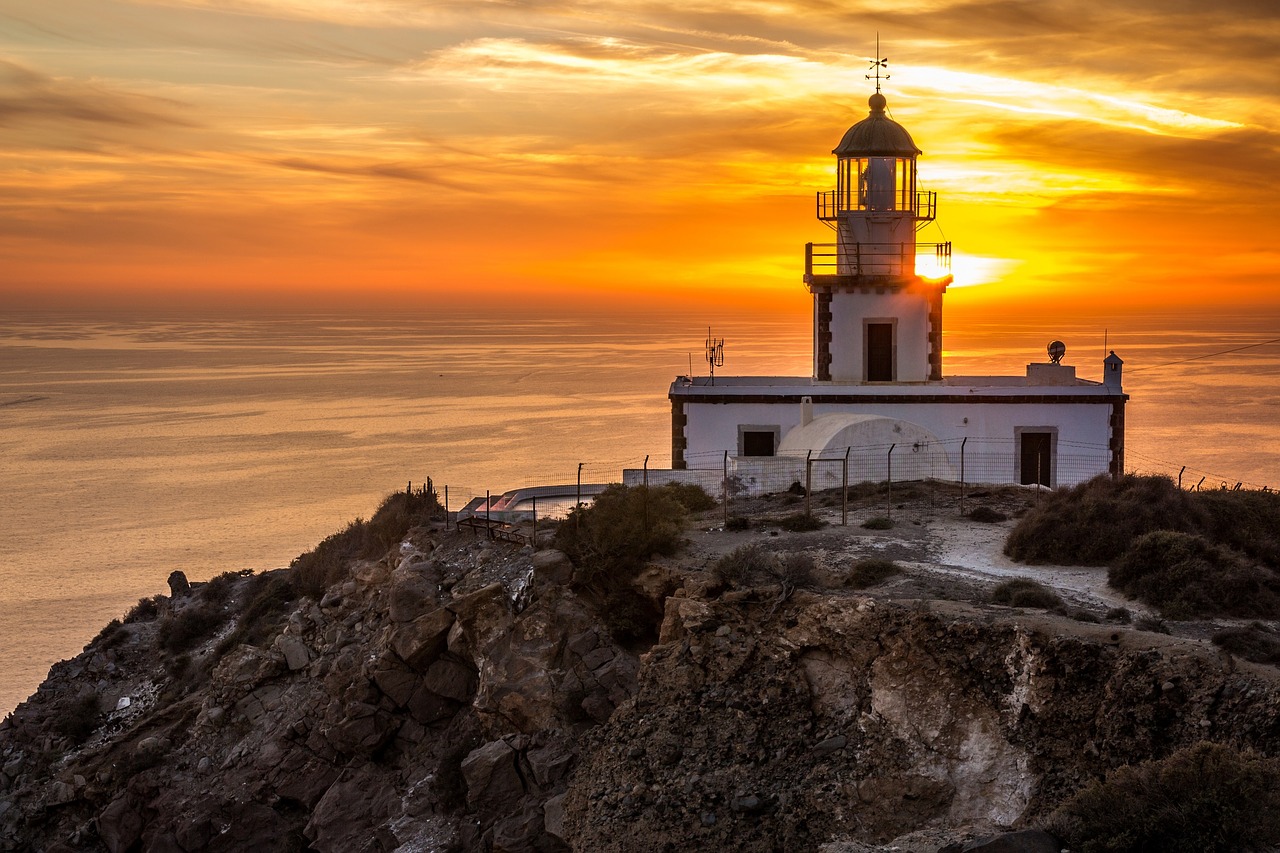 santorini akrotiri lighthouse ocean light free photo