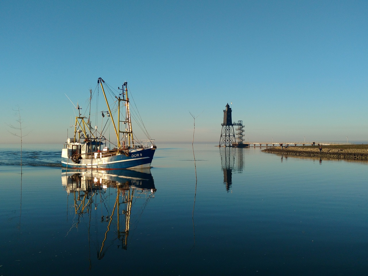 sausage  north sea coast  lighthouse free photo