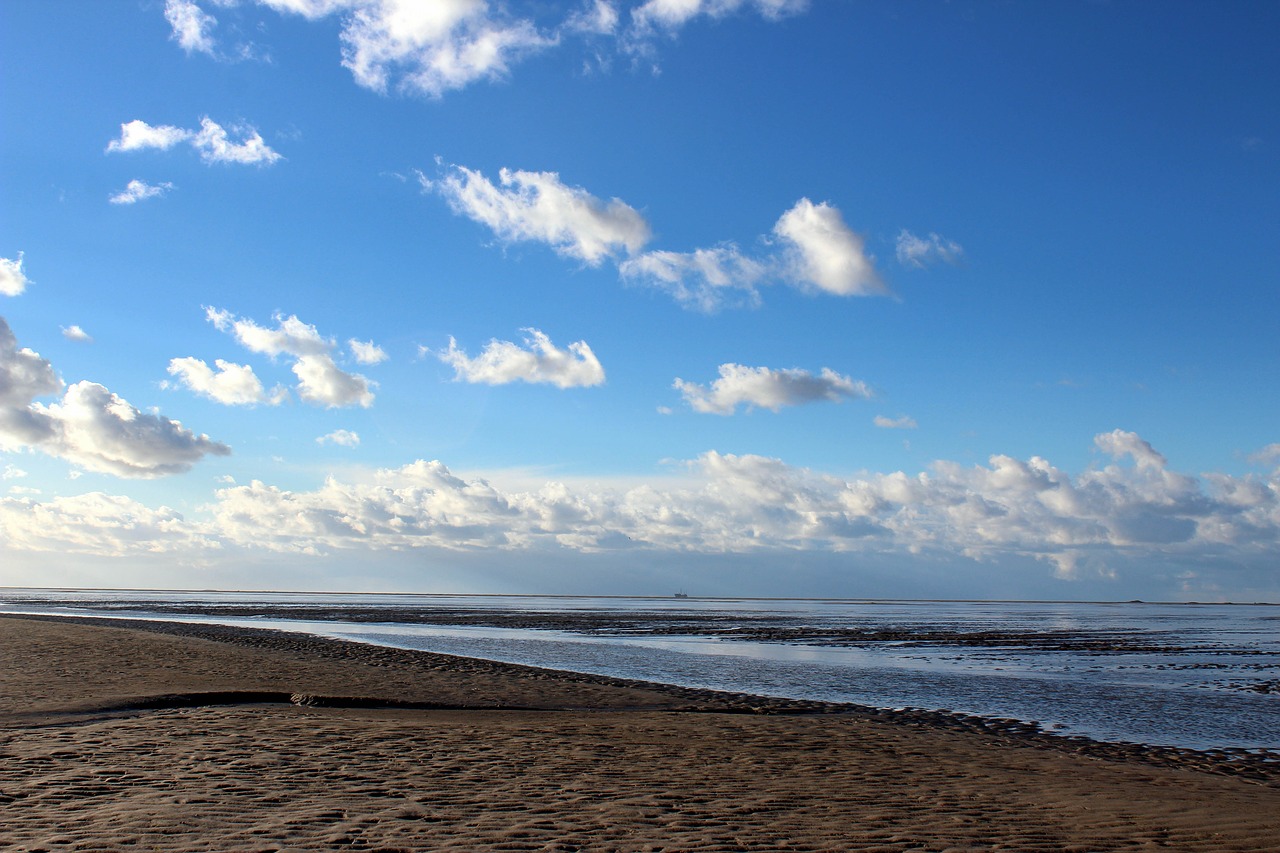 schiermonnikoog  beach  clouds free photo