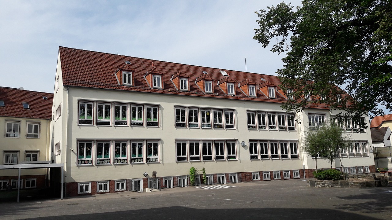 school  the school building  playground free photo