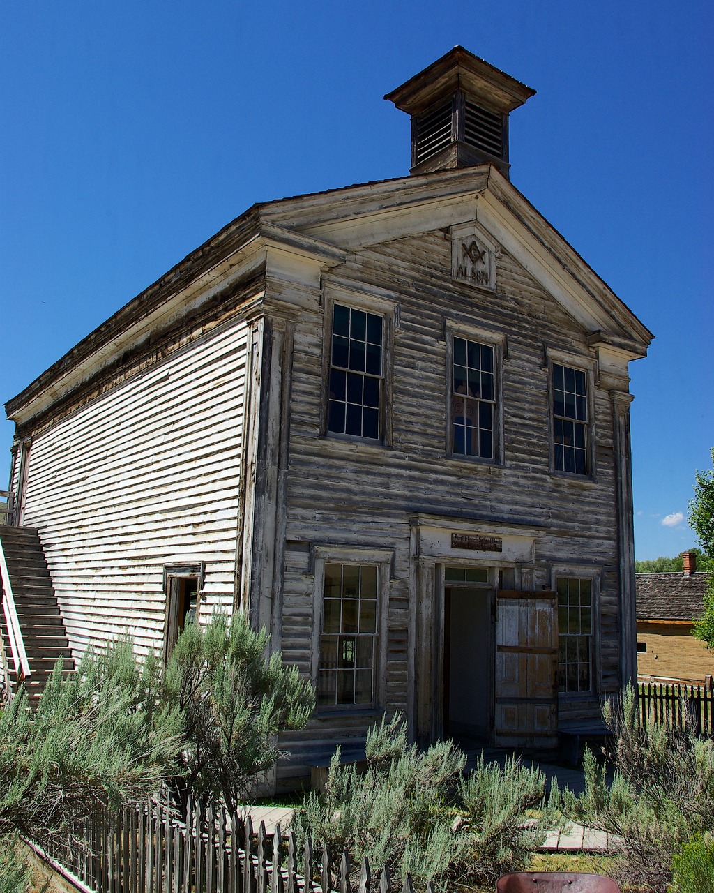 schoolhouse and masonic lodge  montana  bannack free photo