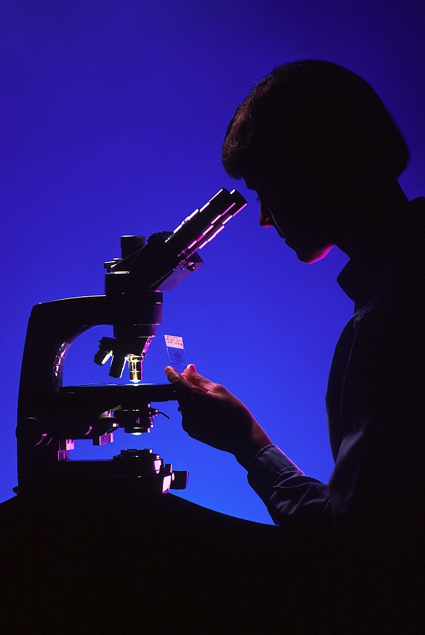 scientist with microscope silhouettes laboratory free photo