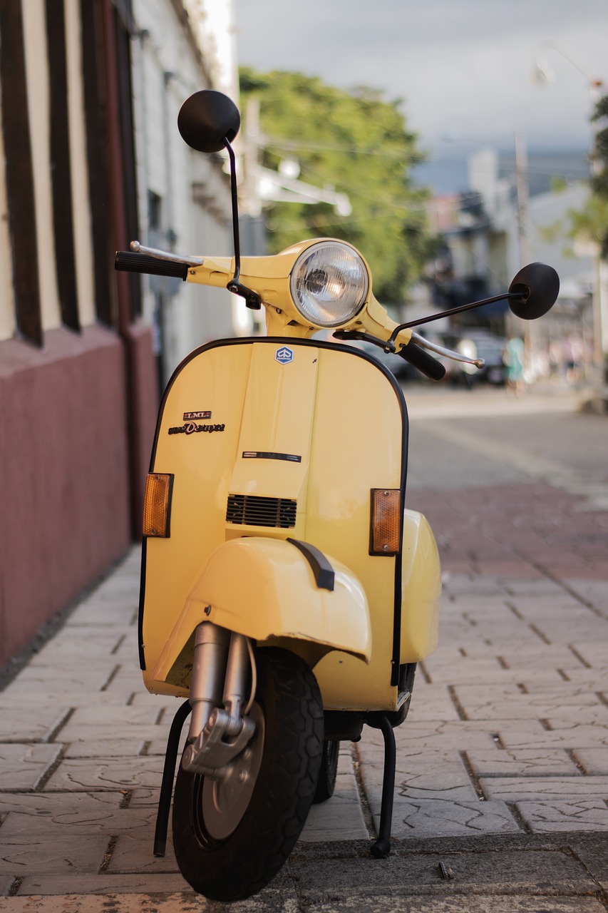 scooter  yellow  vehicle free photo