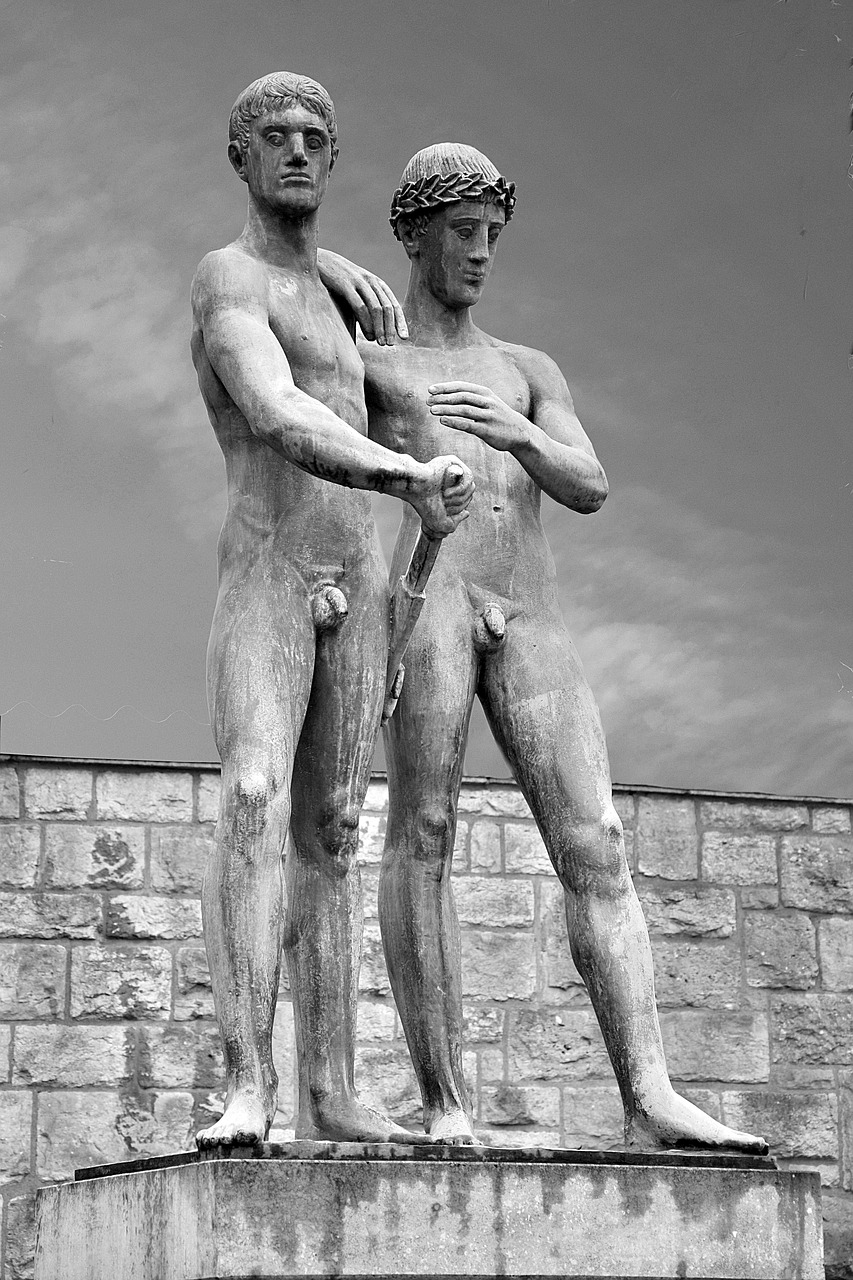 sculpture young men monument free photo