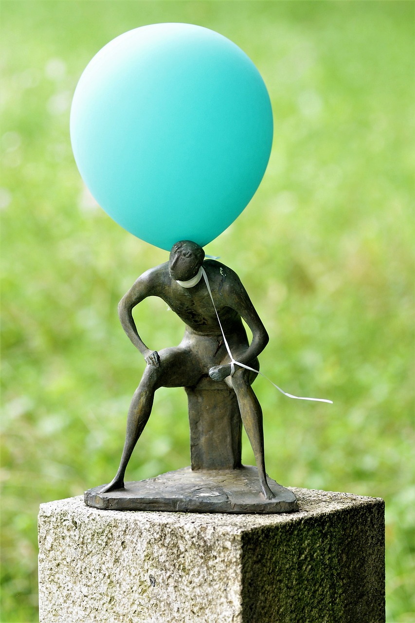 sculpture man sitting one free photo