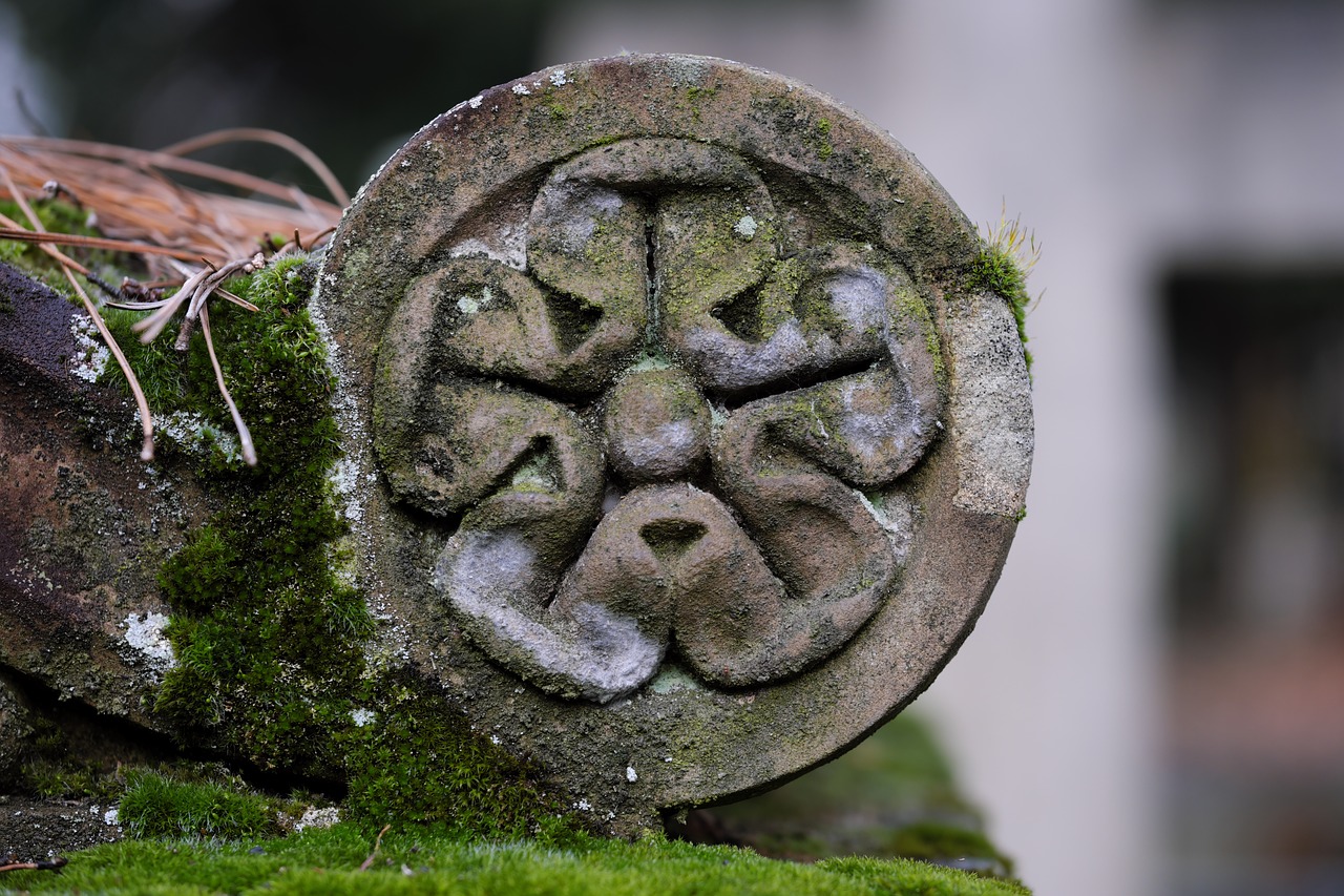 sculpture  stone  moss free photo