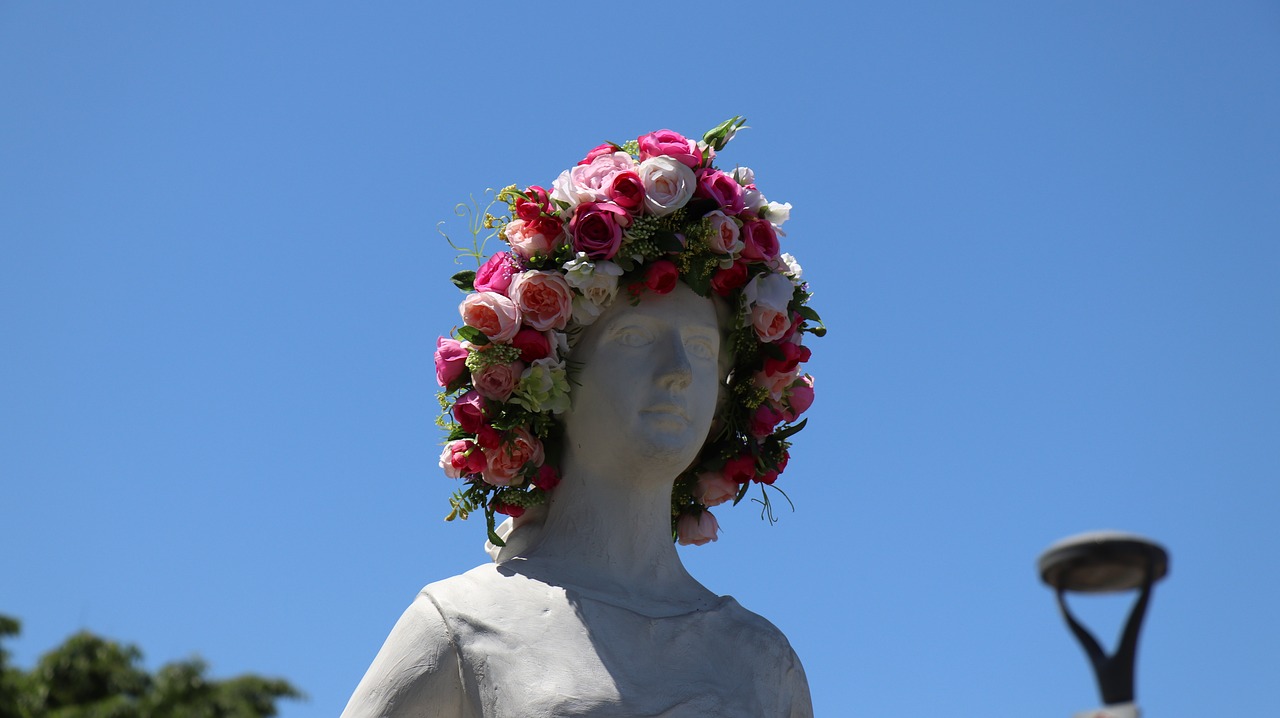 sculpture  rose festival  hair decoration free photo