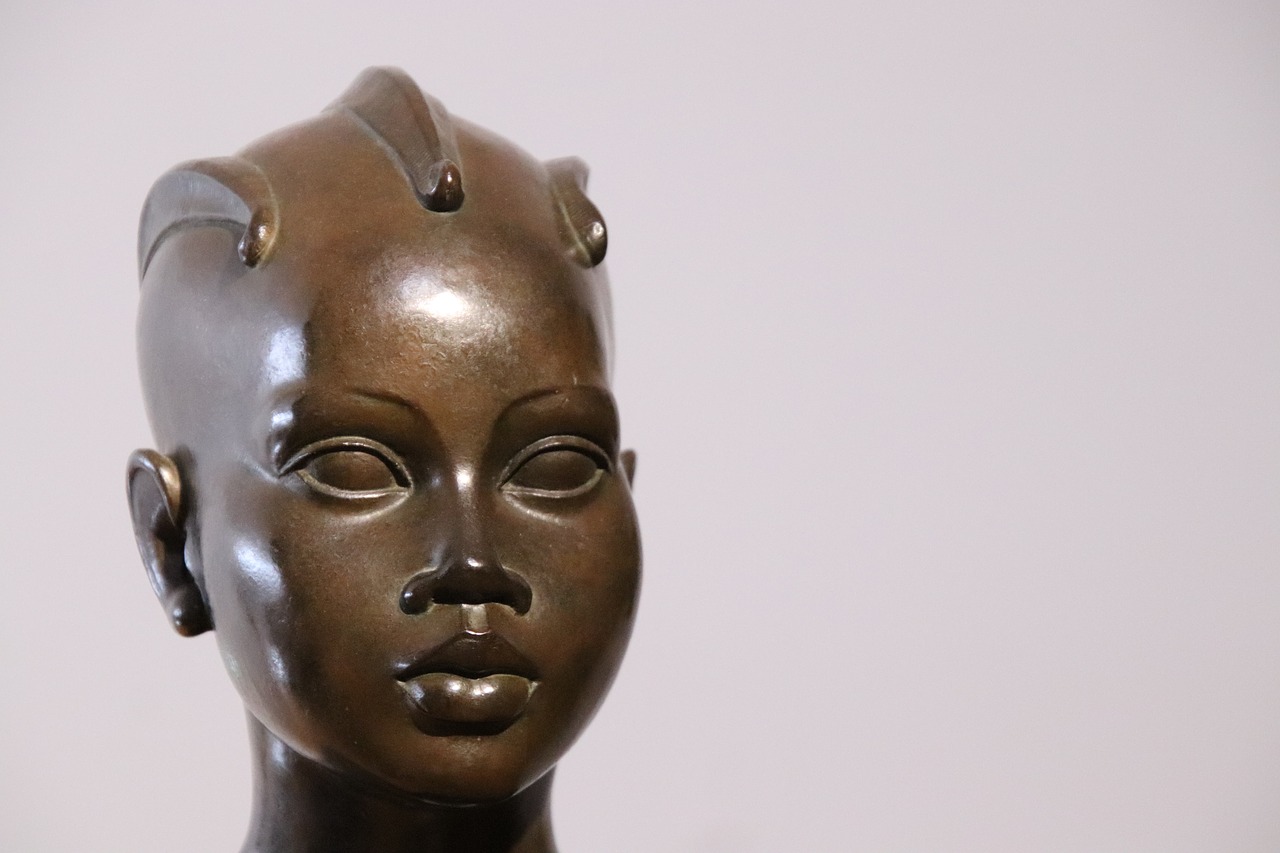 sculpture  bronze  face free photo
