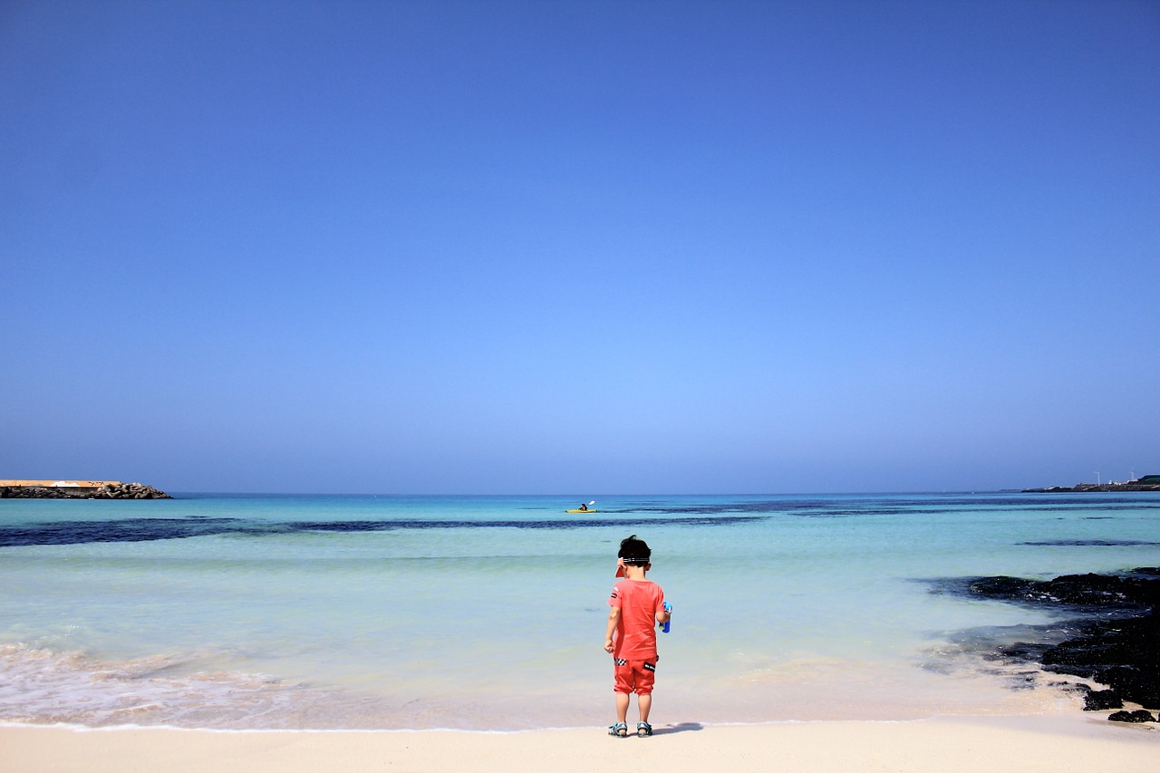 sea boy sand free photo