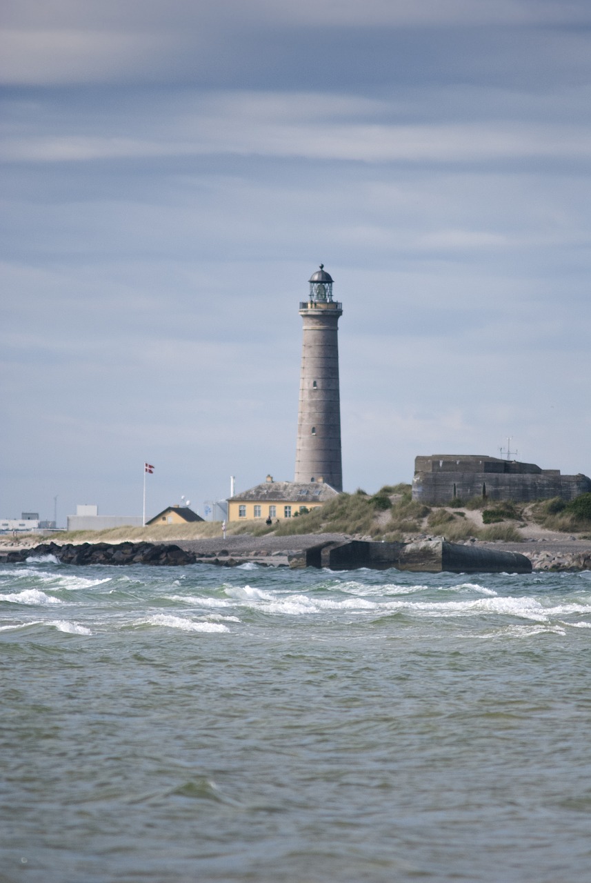 sea lighthouse the waves free photo