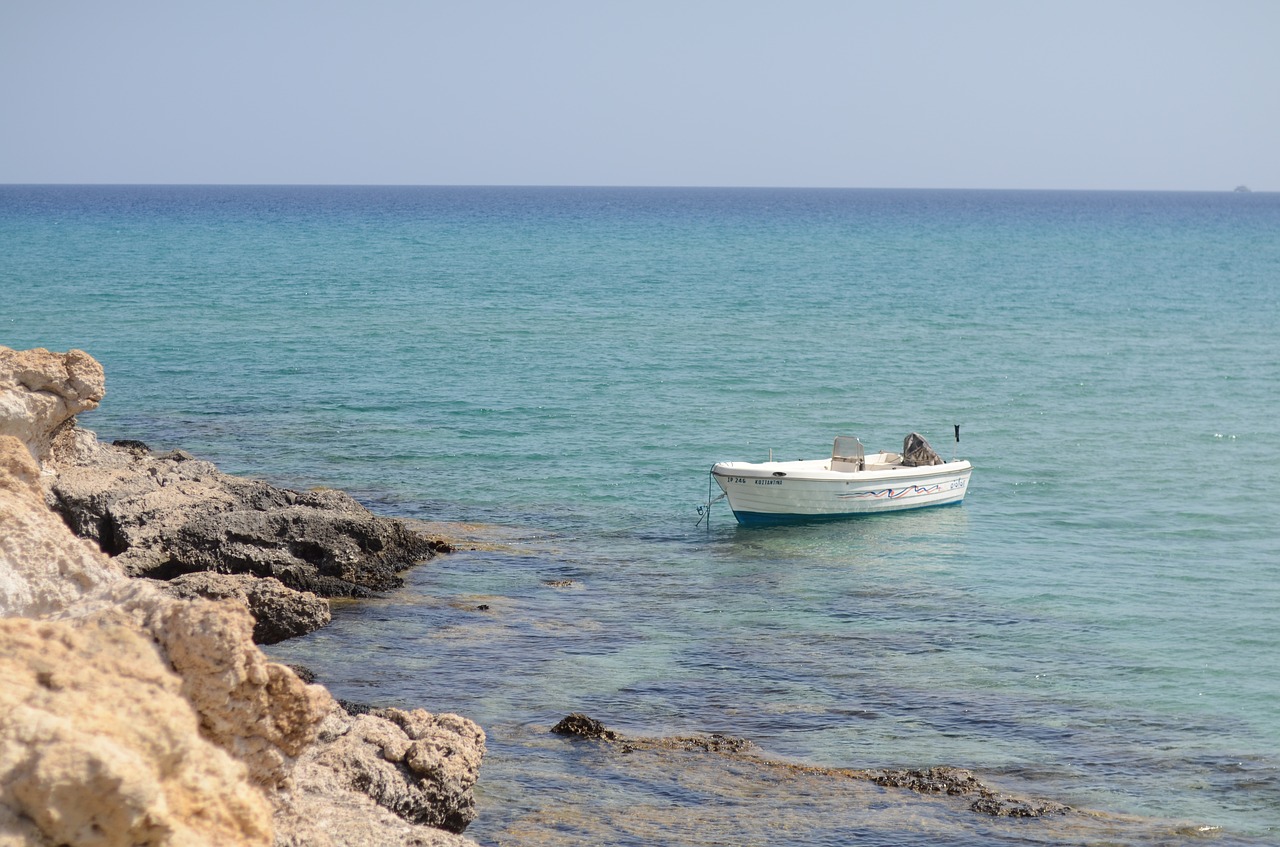 sea boat clear water free photo