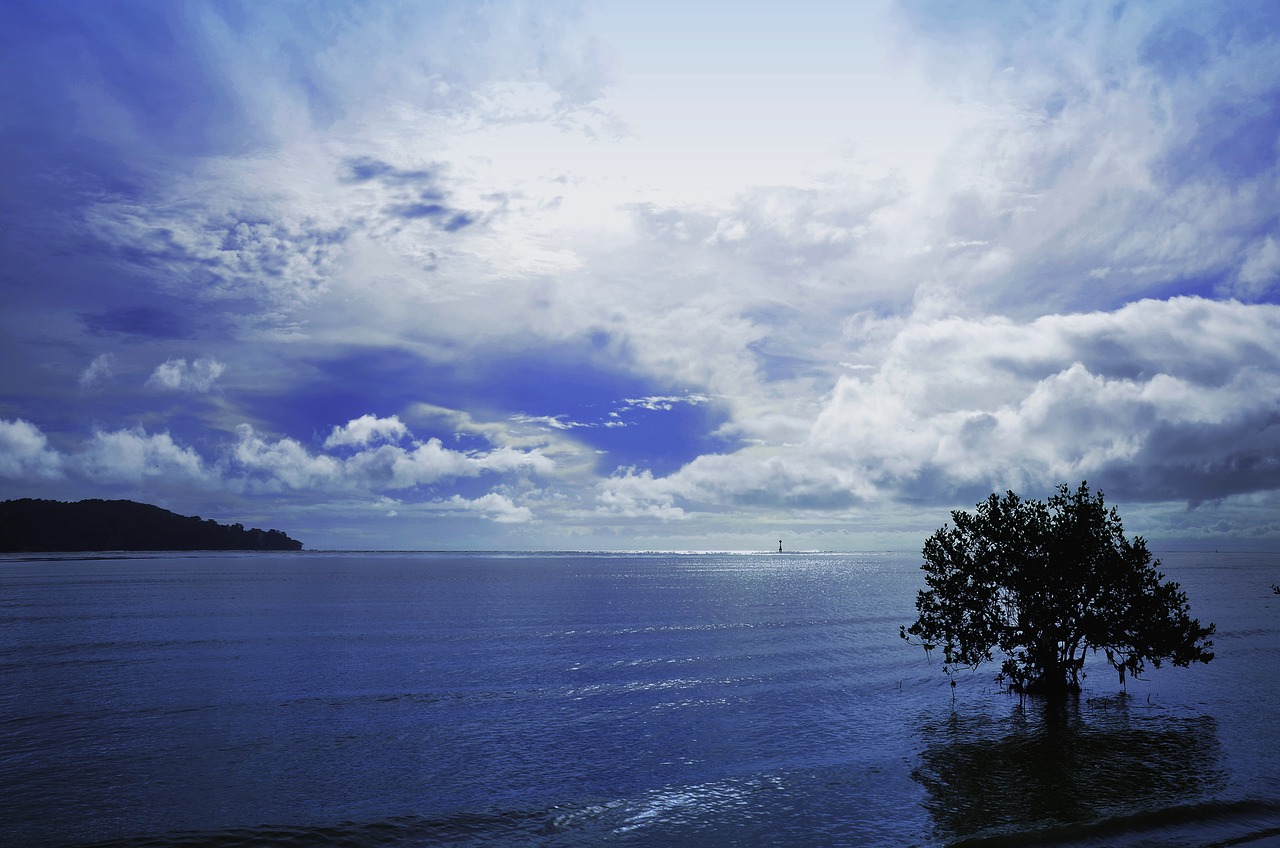 sea blue clouds free photo