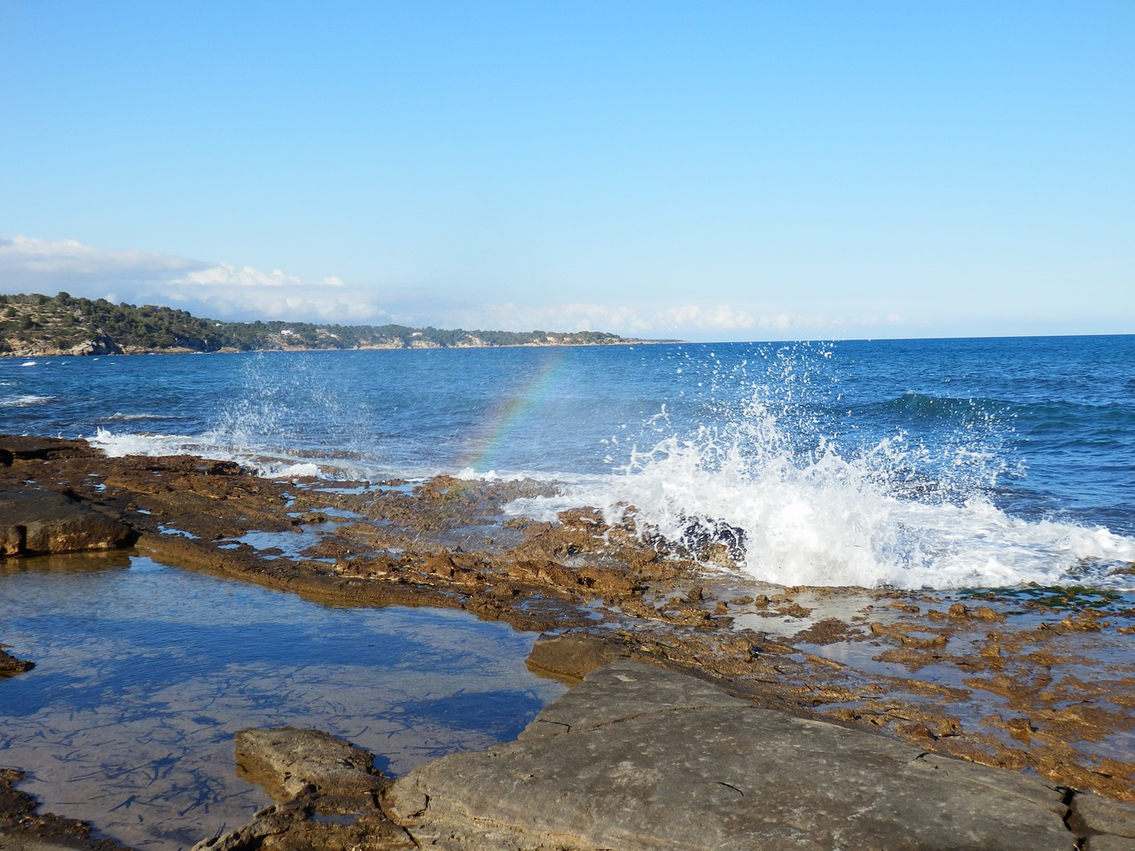 arc iris sea free photo