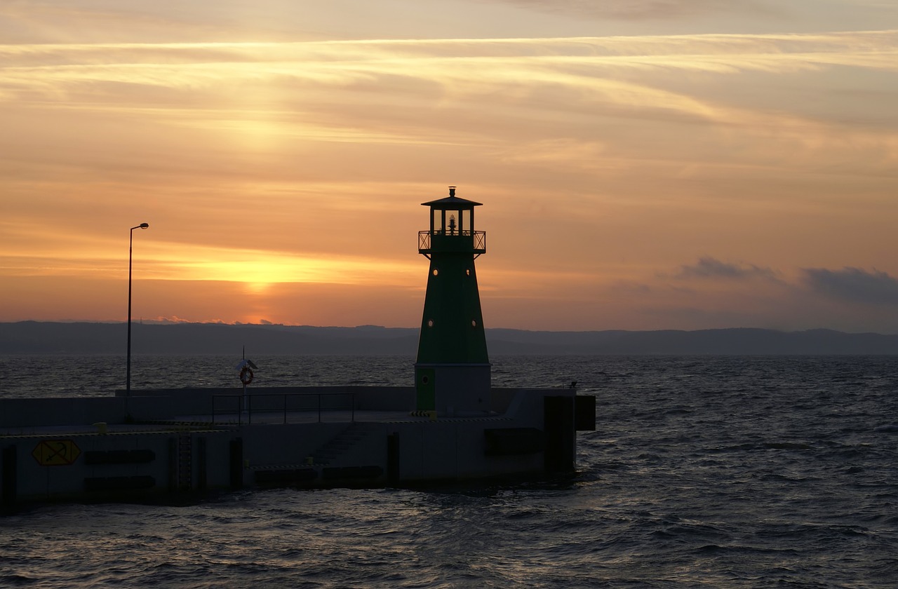 sea lighthouse sea wall free photo