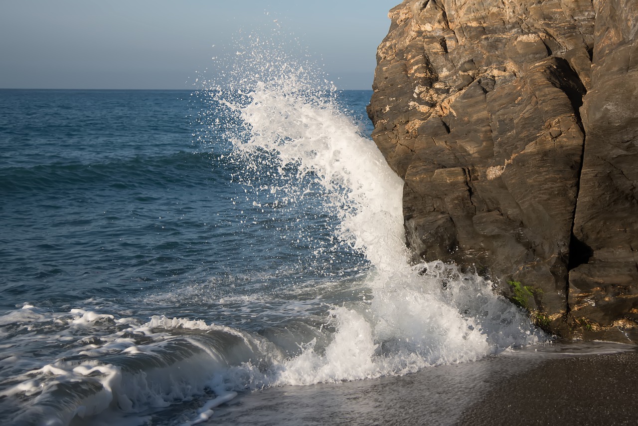 sea wave breakwater free photo