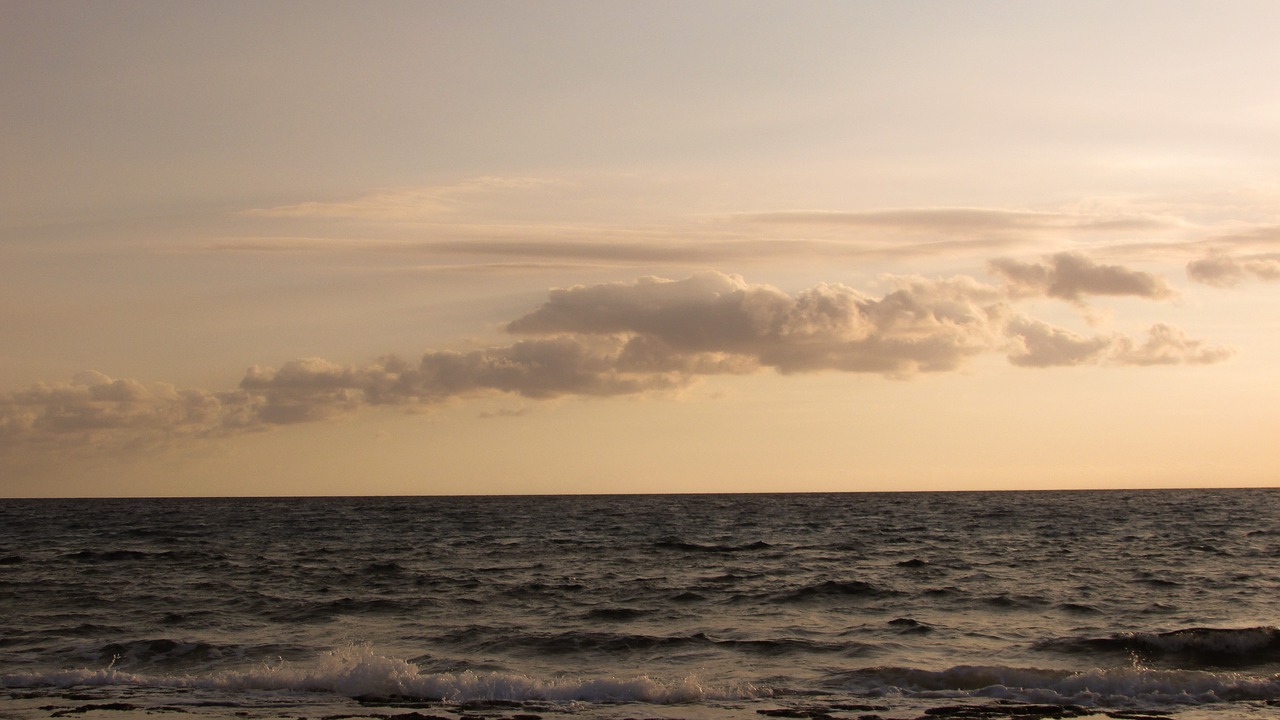 sea beach clouds free photo