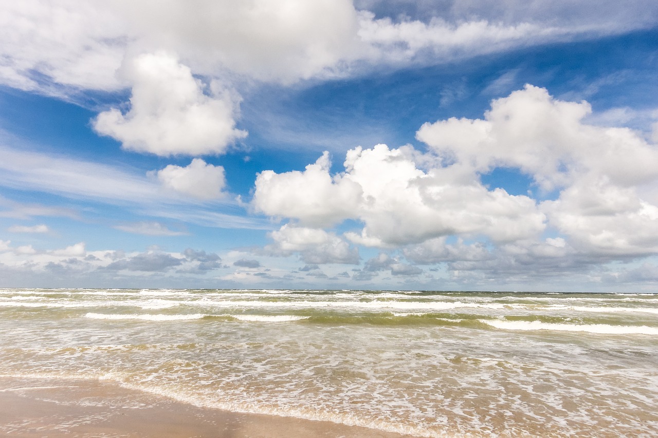 sea beach clouds free photo