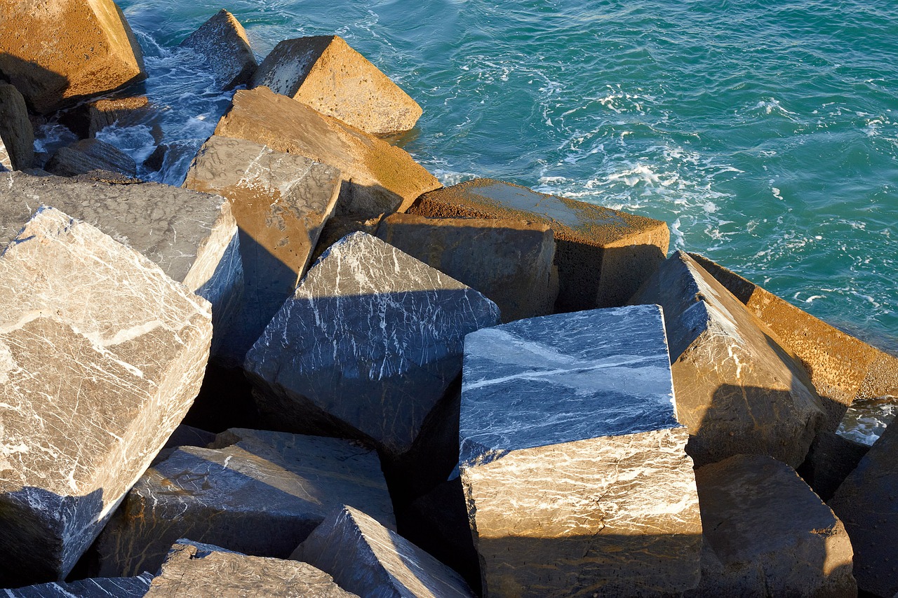 sea dam stones free photo