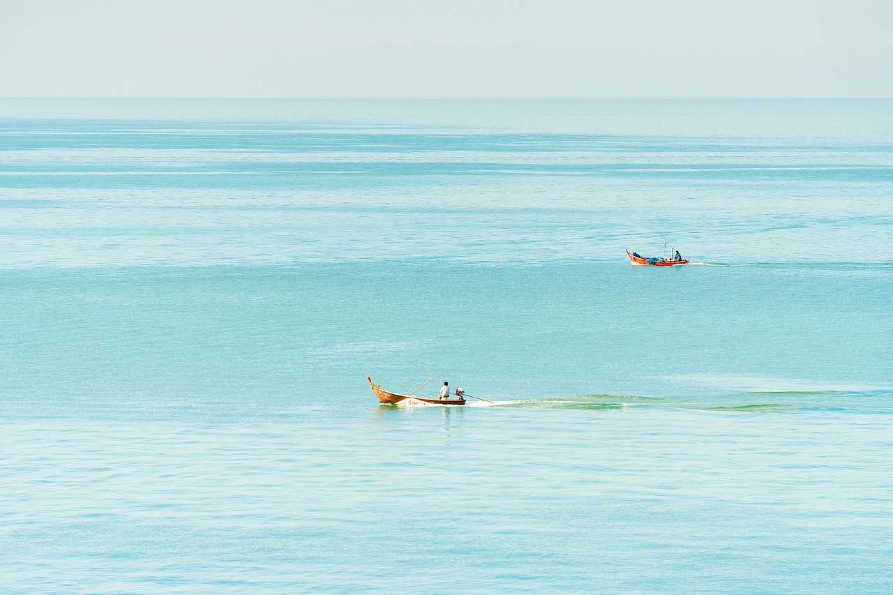 sea boats fishermen free photo