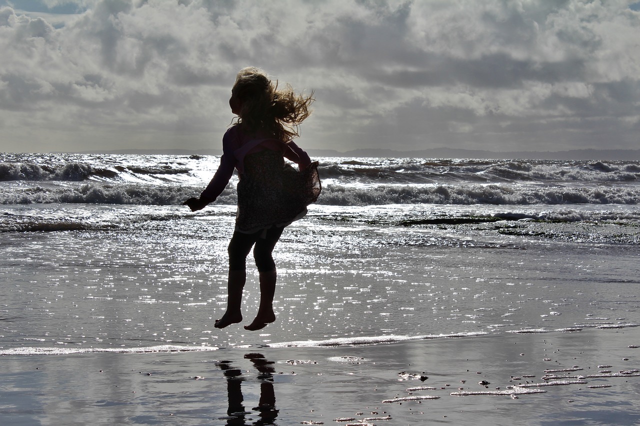 sea girl jumping in water water free photo
