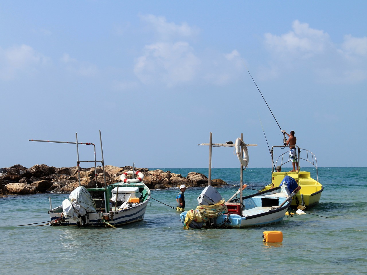 sea boats fishermen free photo