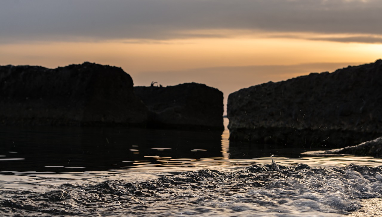 sea stones boulders free photo
