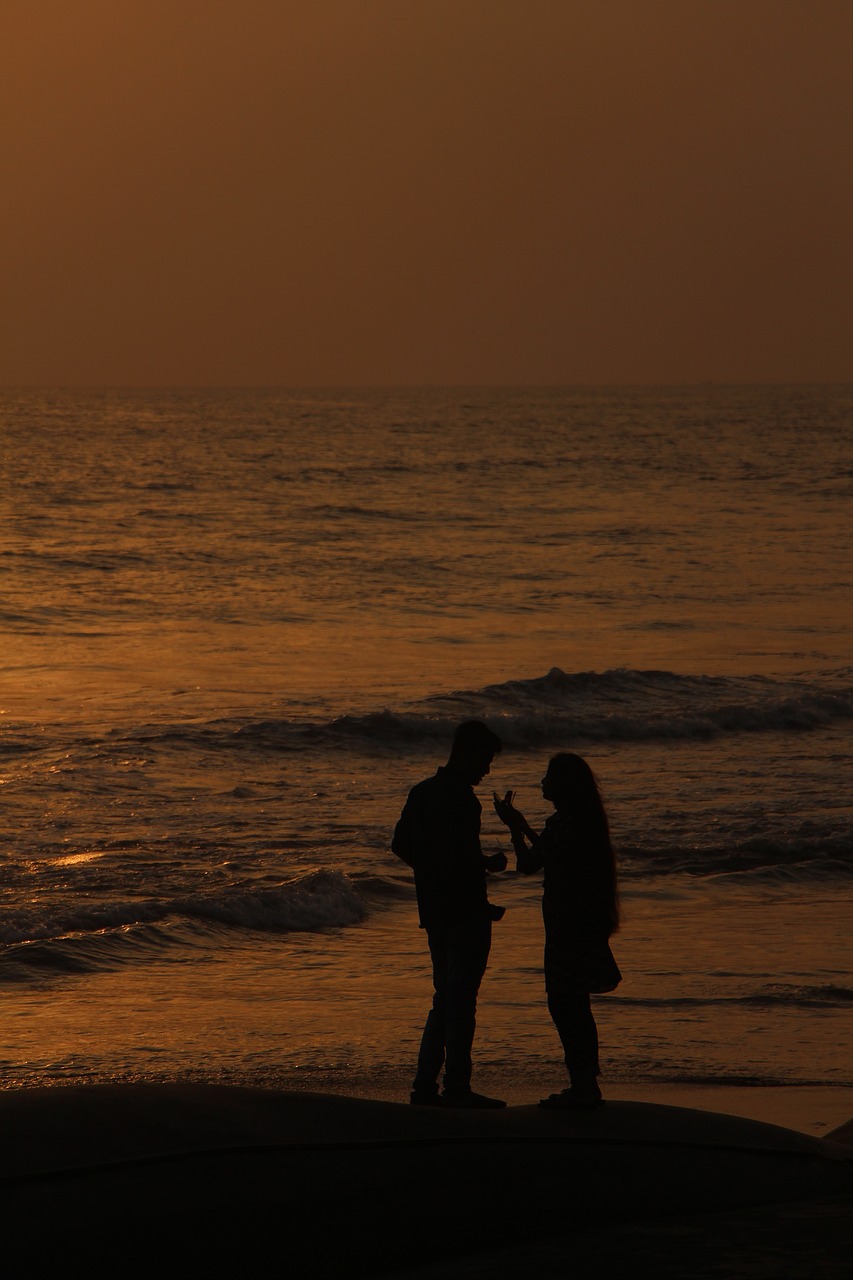 sea couple sunset free photo