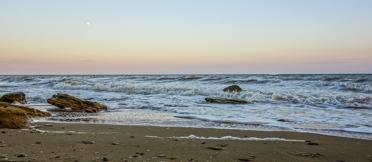 sea sunset stones free photo